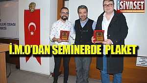 Düzenlenen seminerde plaket verildi