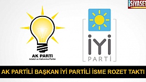 AK Partili başkan İyi Partili isme rozet taktı