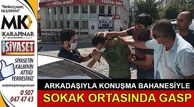 Telefonla konuşma bahanesiyle gasp etti