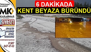 6 dakika devam eden dolu kenti beyaz örtüye büründürdü