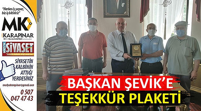 Başkan’a Şevik’e teşekkür plaketi
