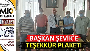 Başkan’a Şevik’e teşekkür plaketi