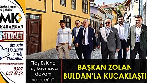 Başkan Zolan Buldan'la kucaklaştı