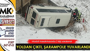 Karda yoldan çıkan yolcu minibüsü şarampole yuvarlandı: 2 yaralı