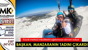 Başkan Zolan yamaç paraşütü yaptı