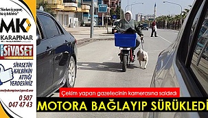 Motora bağladığı köpeği sürükledi