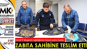 Zabıta pazarda unutulan parayı sahibine teslim etti