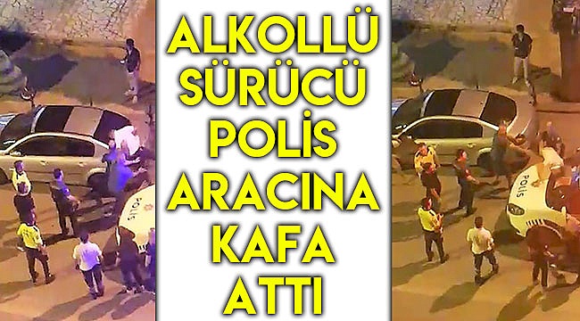 Alkollü sürücü polis aracına kafa attı