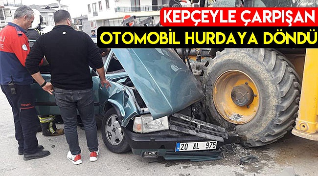 Kepçeyle çarpışan otomobil hurdaya döndü