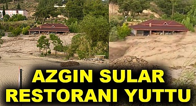 Azgın sular restoranı yuttu