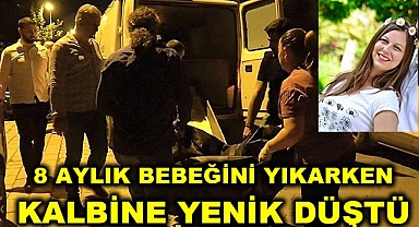 Bebeğini yıkarken kalbine yenik düştü