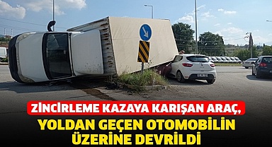 Zincirleme kazaya karışan araç, yoldan geçen otomobilin üzerine devrildi