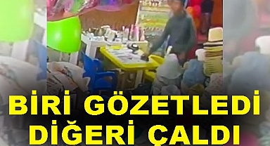 Biri gözetledi, diğeri çaldı!