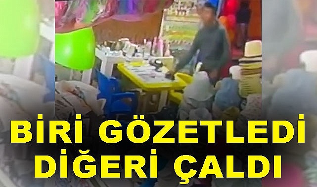 Biri gözetledi, diğeri çaldı!