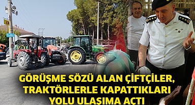 Görüşme sözü alan çiftçiler, traktörlerle kapattıkları yolu ulaşıma açtı