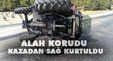 Devrilen traktörün sürücüsü kazayı ucuz atlattı