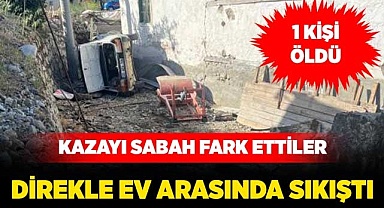 Otomobil direkle ev arasında sıkıştı