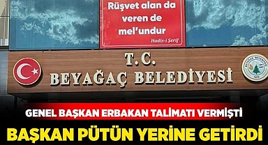 Belediye girişine hadis astı