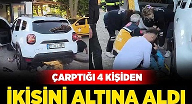 Çarptığı 4 kişiden ikisini altına aldı