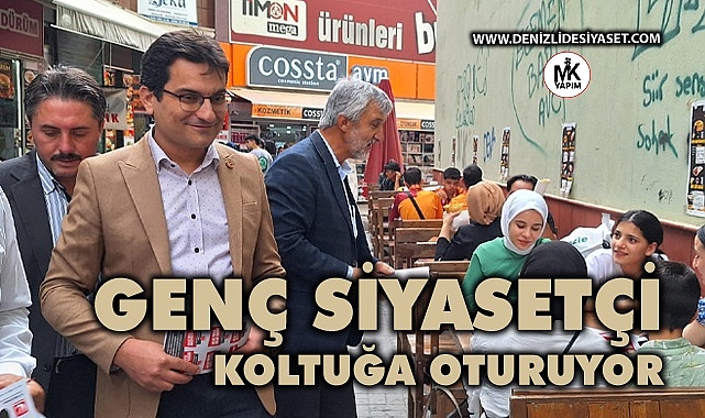 Genç siyasetçi koltuğa oturuyor